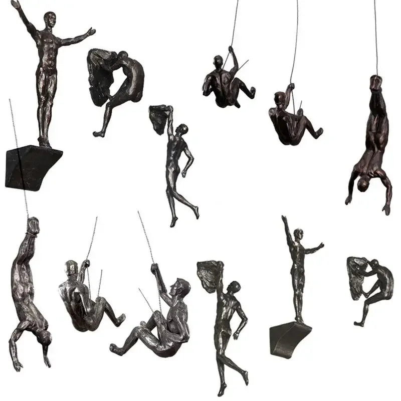 Bronze sculpture set of human figures climbing and hanging from ropes and rocks, artistic home decor