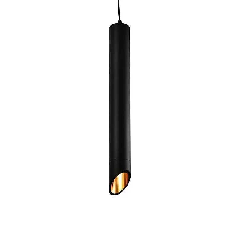 Modern black cylindrical pendant light with angled warm gold interior hanging on white background