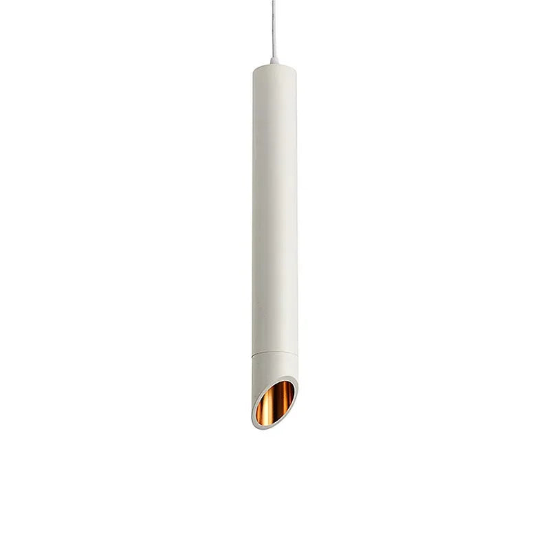 Modern white cylindrical pendant light with angled copper interior, suspended by white cord