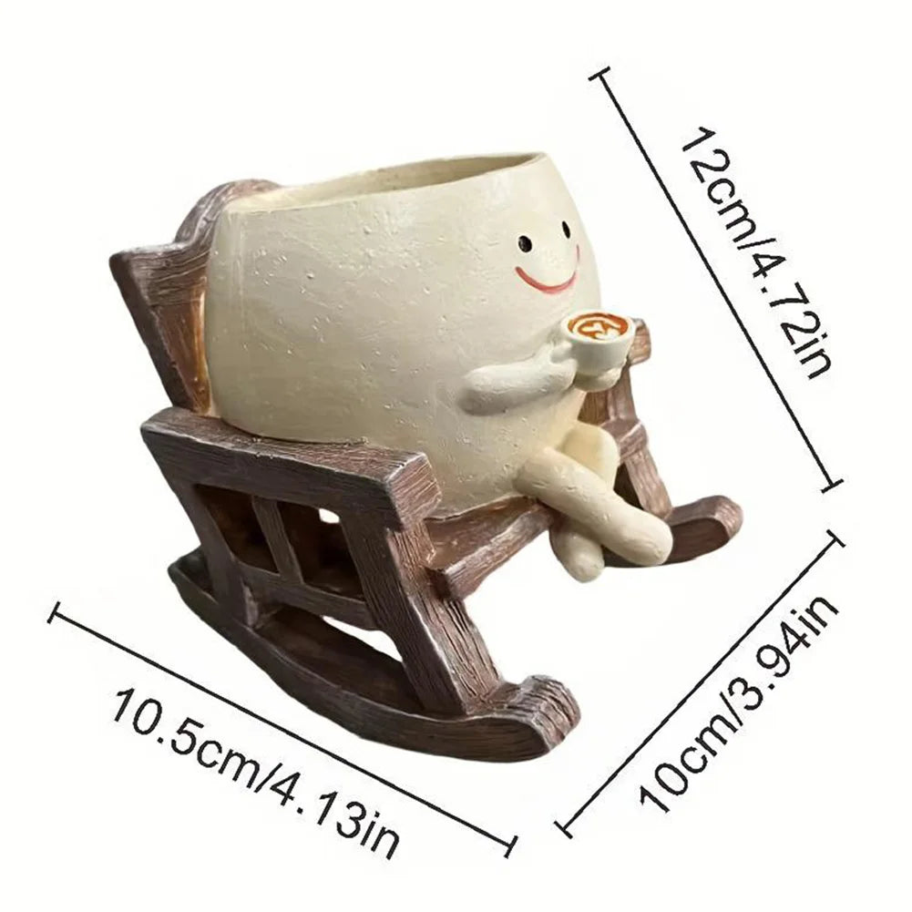 Creative rocking chair/swing shaped planter for succulents, ideal for indoor and outdoor plants.