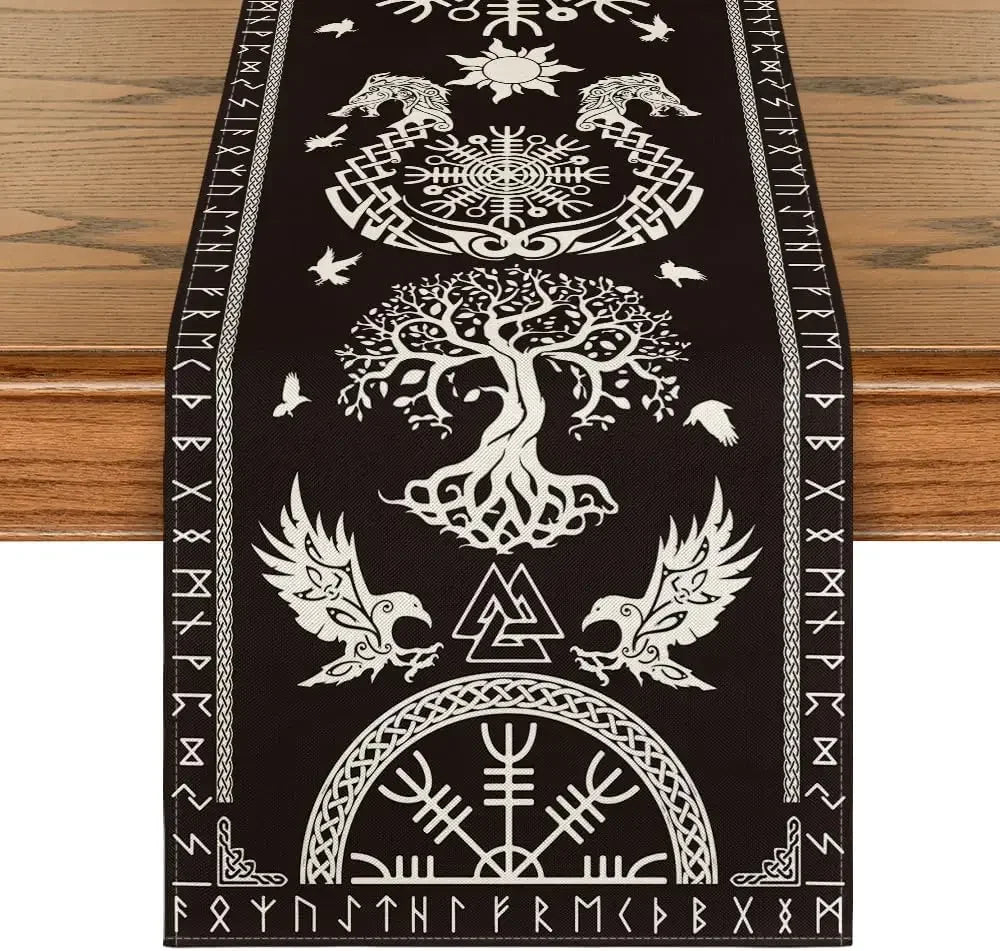 Black table runner with white Viking symbols including Yggdrasil tree, ravens, runes, and intricate knot patterns