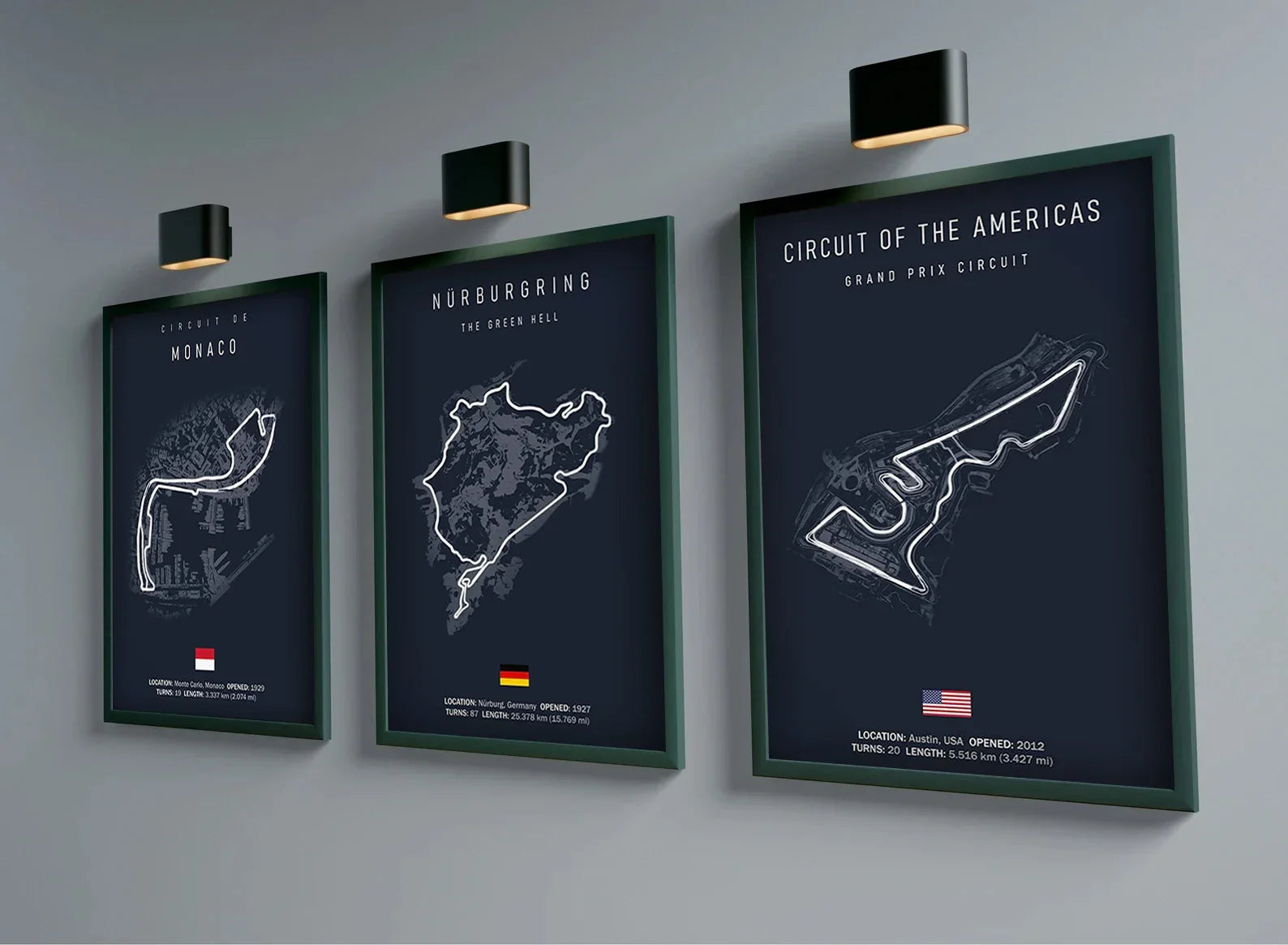 Three framed black and white posters of famous Grand Prix circuits Monaco, Nürburgring, and Circuit of the Americas on a gray wall