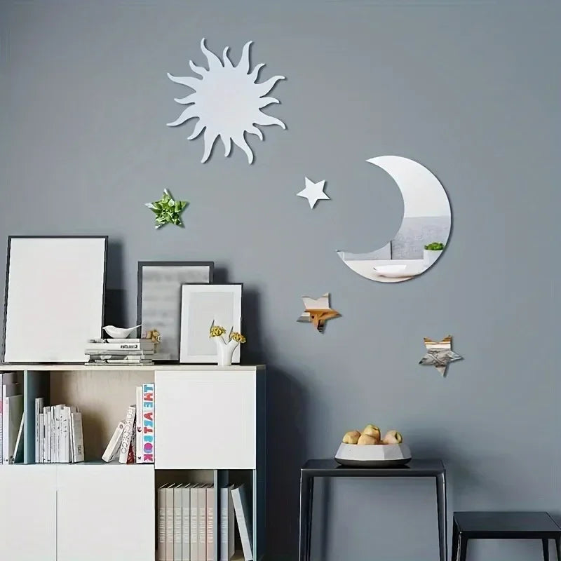 Modern living room with gray wall, decorative sun, moon, and star mirrors, white shelving with books and vases