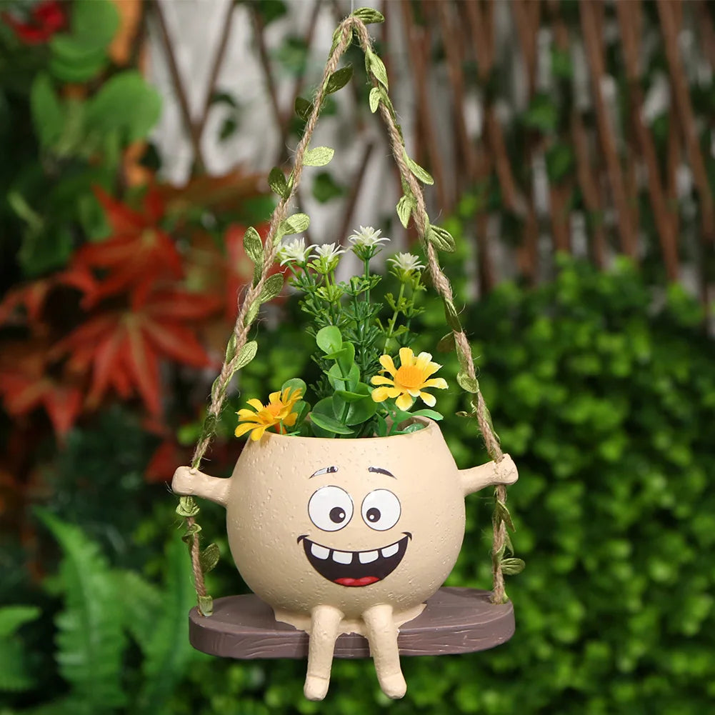 Creative rocking chair/swing shaped planter for succulents, ideal for indoor and outdoor plants.