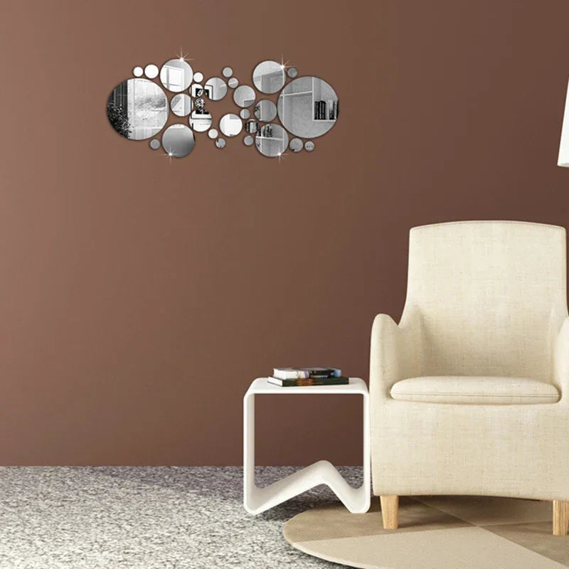 Modern living room with beige armchair, white side table, sculptural wall mirror against brown wall