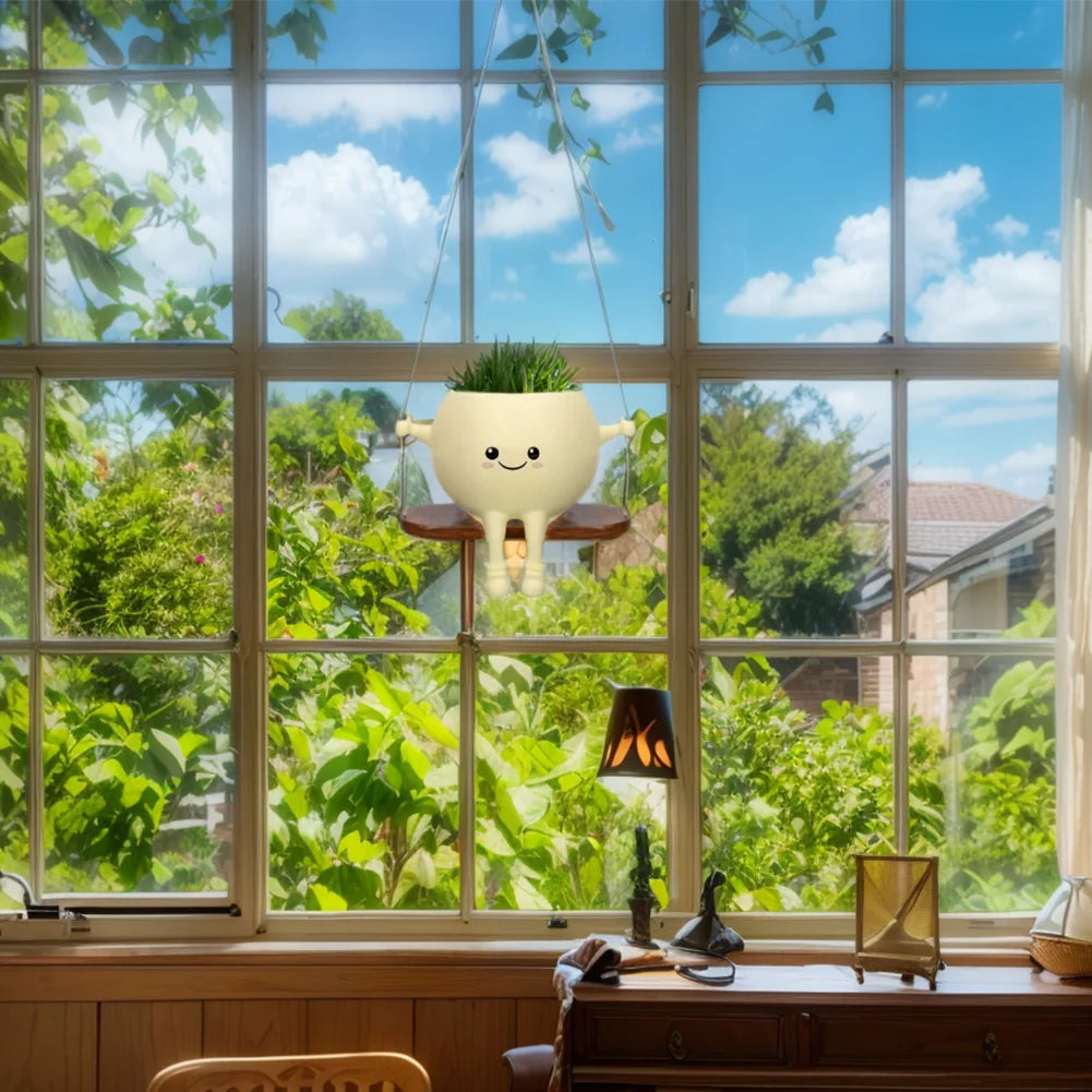 Creative rocking chair/swing shaped planter for succulents, ideal for indoor and outdoor plants.